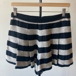 Alice + Olivia pleated shorts with black and grey/silver stripes.